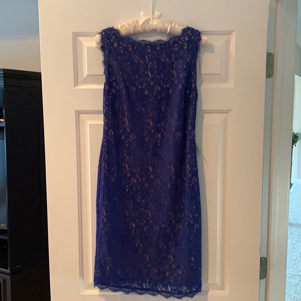 Sleeveless lace mini dress; beautiful blue color with nude underlay